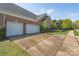 Brick home featuring an attached two car garage at 3304 Taviston Dr, Waxhaw, NC 28173