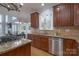 Modern kitchen featuring granite countertops, stainless steel appliances and open layout at 3304 Taviston Dr, Waxhaw, NC 28173