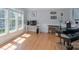 Bright office space with large windows and hardwood flooring, ideal for remote work at 3304 Taviston Dr, Waxhaw, NC 28173