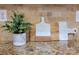A close up of granite countertops and decorative wall backsplash in the kitchen at 3304 Taviston Dr, Waxhaw, NC 28173