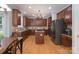 Well-equipped kitchen with custom cabinetry, granite countertops, and stainless steel appliances at 3304 Taviston Dr, Waxhaw, NC 28173