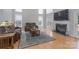 Spacious living room with fireplace and large windows, perfect for gatherings and relaxation at 3304 Taviston Dr, Waxhaw, NC 28173