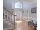 Grand foyer with soaring ceilings, hardwood floors, and an abundance of natural light at 3304 Taviston Dr, Waxhaw, NC 28173