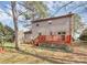 View of the back of the house featuring a deck and large backyard at 335 Deep Forest Ct, Gastonia, NC 28056