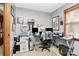 Cozy home office space featuring dual monitors, warm wood accents, and personal touches at 335 Deep Forest Ct, Gastonia, NC 28056