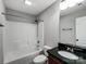 Bathroom with shower and tub combo and dark countertops at 350 Belvedere Nw Dr, Concord, NC 28027