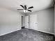 Cozy bedroom with ceiling fan, and carpet flooring at 350 Belvedere Nw Dr, Concord, NC 28027
