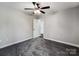 Bright bedroom with a ceiling fan and a closet at 350 Belvedere Nw Dr, Concord, NC 28027