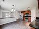 Open-concept kitchen with stainless steel appliances, dark countertops, and view of the living area at 350 Belvedere Nw Dr, Concord, NC 28027