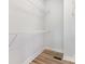 Walk-in closet with wire shelving and wood-look flooring in a new construction home at 409 Bost St, Kannapolis, NC 28081