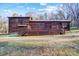 Rear view of the house showing the deck and yard at 455 Pinhook Loop Rd, Gastonia, NC 28056
