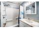Bathroom featuring a shower and tub combination with a vanity and mirrored medicine cabinet at 455 Pinhook Loop Rd, Gastonia, NC 28056