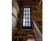 Unique door with frosted glass panels and wood frame, adding rustic charm to the interior at 5412 Carving Tree Dr, Harrisburg, NC 28075