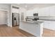Modern kitchen with granite countertops, stainless steel appliances, and ample cabinet space at 5708 Skinny Dr, Charlotte, NC 28215