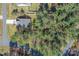Aerial view showcases home and wooded surroundings at 6615 Buck Horn Pl, Waxhaw, NC 28173