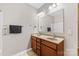 Bathroom features a double sink vanity with a large mirror and modern fixtures at 6615 Buck Horn Pl, Waxhaw, NC 28173