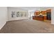 Spacious living room featuring an open floorplan and large windows at 6615 Buck Horn Pl, Waxhaw, NC 28173