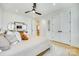 Bedroom with neutral tones, wooden accents, plush bedding, and ample closet space at 805 E 19Th St, Charlotte, NC 28205