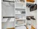Organized closet with built-in shelving, hanging rods, and ample storage for clothing, towels, and linens at 805 E 19Th St, Charlotte, NC 28205