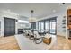 Elegant dining room featuring a modern chandelier and seating for eight guests, perfect for entertaining at 805 E 19Th St, Charlotte, NC 28205