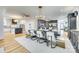Spacious dining area with sleek decor, a large table for gatherings, and a chandelier at 805 E 19Th St, Charlotte, NC 28205