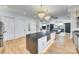 Bright kitchen featuring pendant lighting over an island, flowing into dining and living spaces at 805 E 19Th St, Charlotte, NC 28205