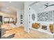 Open-concept layout with hardwood floors and a glimpse into the dining and living spaces at 805 E 19Th St, Charlotte, NC 28205