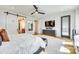 Stylish main bedroom featuring an ensuite bathroom, ceiling fan, and natural light at 805 E 19Th St, Charlotte, NC 28205