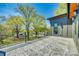 Expansive outdoor patio with patterned tile flooring and scenic treetop views at 805 E 19Th St, Charlotte, NC 28205