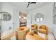 Inviting sitting room with comfortable leather chairs and views into the adjacent room at 805 E 19Th St, Charlotte, NC 28205
