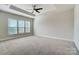 Spacious bedroom with ample natural light and neutral carpeting at 8513 Garden View Dr, Charlotte, NC 28277