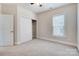 Bedroom with neutral walls, carpet, closet, and window at 8513 Garden View Dr, Charlotte, NC 28277