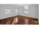 Bedroom with hardwood floors, lots of natural light, and neutral walls at 8812 Provence Village Ln, Charlotte, NC 28226