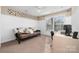Bright bedroom features a futon, desk, and large window at 1025 Hunter Valley Rd, Shelby, NC 28150