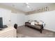 Neutral bedroom features a futon, desk, and carpet flooring at 1025 Hunter Valley Rd, Shelby, NC 28150