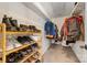 Walk-in closet featuring built-in shelving, hanging racks, and ample space for shoes and clothing at 1025 Hunter Valley Rd, Shelby, NC 28150