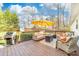 Spacious deck offering a fire pit and comfortable seating, creating an inviting outdoor living space at 1025 Hunter Valley Rd, Shelby, NC 28150