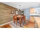 Cozy dining area with wooden table and chairs adjacent to the kitchen, ideal for casual Gathering meals at 1025 Hunter Valley Rd, Shelby, NC 28150