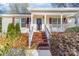 Charming home entrance with brick steps and covered porch at 1025 Hunter Valley Rd, Shelby, NC 28150