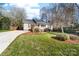 Charming single-story home features a well-manicured front yard with mature trees and a curved driveway at 1025 Hunter Valley Rd, Shelby, NC 28150