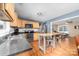 Well-lit kitchen featuring stainless steel appliances, center island, and open access to the living area at 1025 Hunter Valley Rd, Shelby, NC 28150