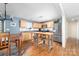Bright eat-in kitchen featuring stainless steel appliances, wooden cabinets and a butcher block island with seating at 1025 Hunter Valley Rd, Shelby, NC 28150
