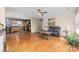 Open-concept living room with hardwood floors connecting to a kitchen with a butcher block island at 1025 Hunter Valley Rd, Shelby, NC 28150