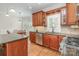 Stainless steel appliances and granite countertops give this kitchen a modern feel at 10332 Hollybrook Dr, Charlotte, NC 28277