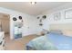 Bedroom features neutral walls, carpeted floor, comfortable bed and bright lighting at 1037 Delridge St, Waxhaw, NC 28173