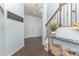 Stylish entryway with hardwood floors, decorative elements, and staircase leading to upper level at 1037 Delridge St, Waxhaw, NC 28173