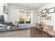 Dedicated home office with hardwood floors, window views, and a well-lit workspace at 1037 Delridge St, Waxhaw, NC 28173
