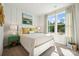 Cozy bedroom with natural light, white trim, and an inviting design with yellow decor at 1048 Arundle Rd, Sherrills Ford, NC 28673
