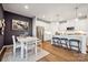 Charming kitchen/dining area featuring stainless steel appliances and modern pendant lighting at 1048 Arundle Rd, Sherrills Ford, NC 28673
