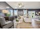 Stylish living room with modern furniture, a ceiling fan, and plenty of natural light at 1048 Arundle Rd, Sherrills Ford, NC 28673